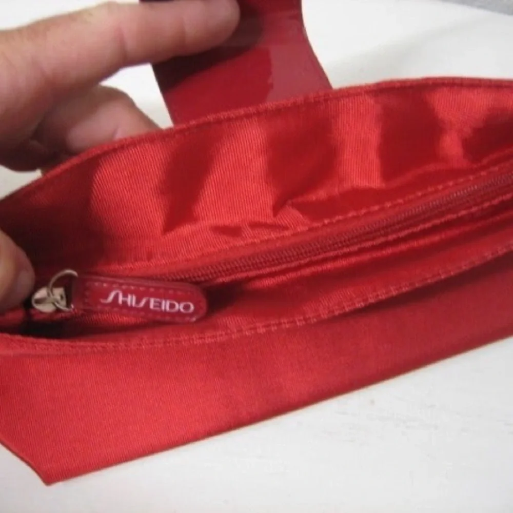 shiseido red makeup clutch bag